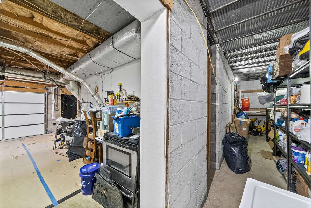 2 Car Garage on Basement Level Featuring Storm Shelter and Storage Space. This house is clean and ready for your family.
