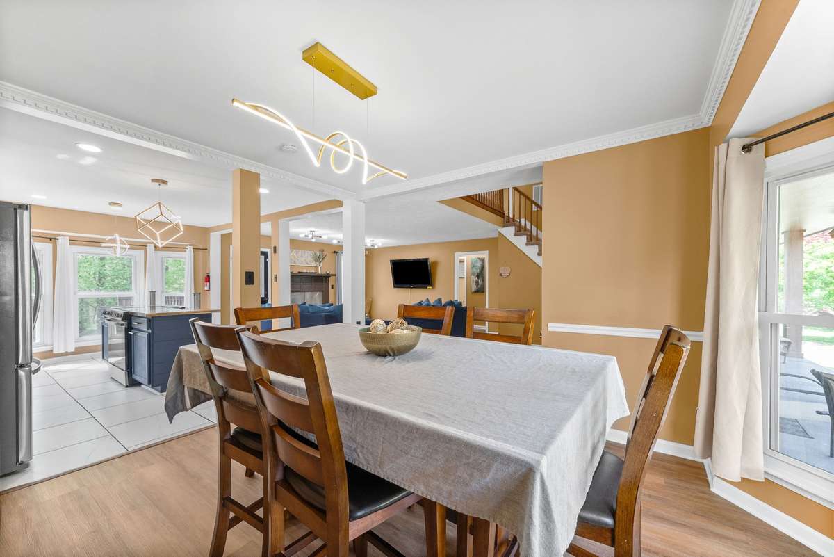 2nd View of Formal Dining Room. Fancy Lighting here too!