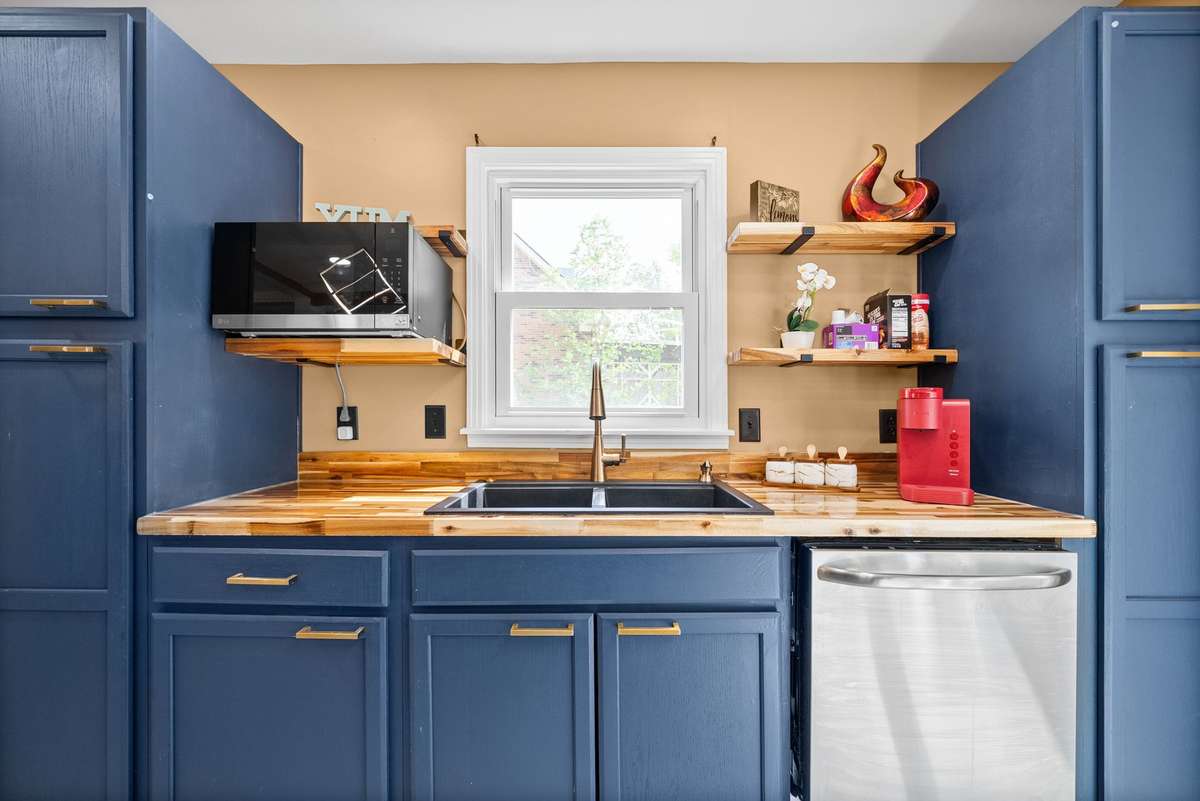 Kitchen with Window over the sink Floating Shelves