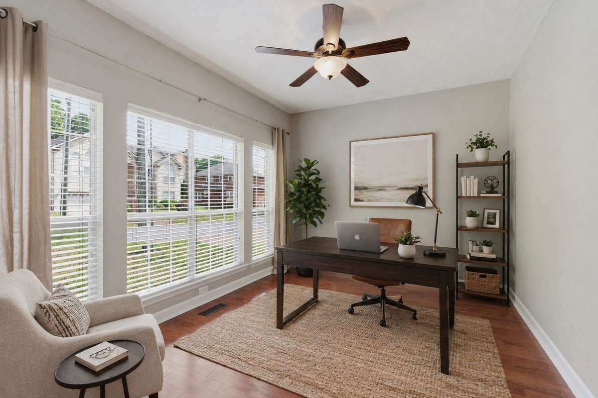 Bright and versatile, this space is filled with natural light and warm hardwood floors. Ideal as a fourth bedroom, home office, or flex room, it offers a clean, neutral backdrop and an easy layout to fit your needs. - Virtually staged