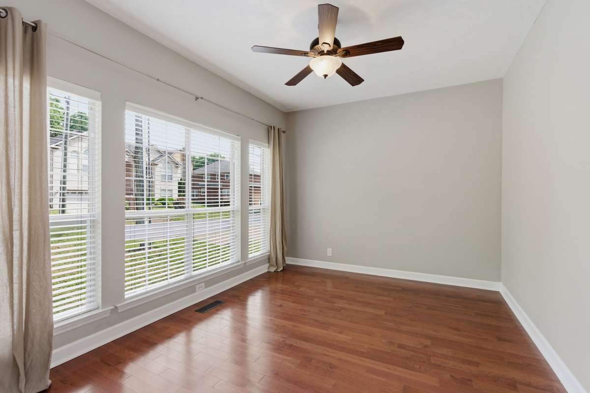 Bright and versatile, this space is filled with natural light and warm hardwood floors. Ideal as a fourth bedroom, home office, or flex room, it offers a clean, neutral backdrop and an easy layout to fit your needs.