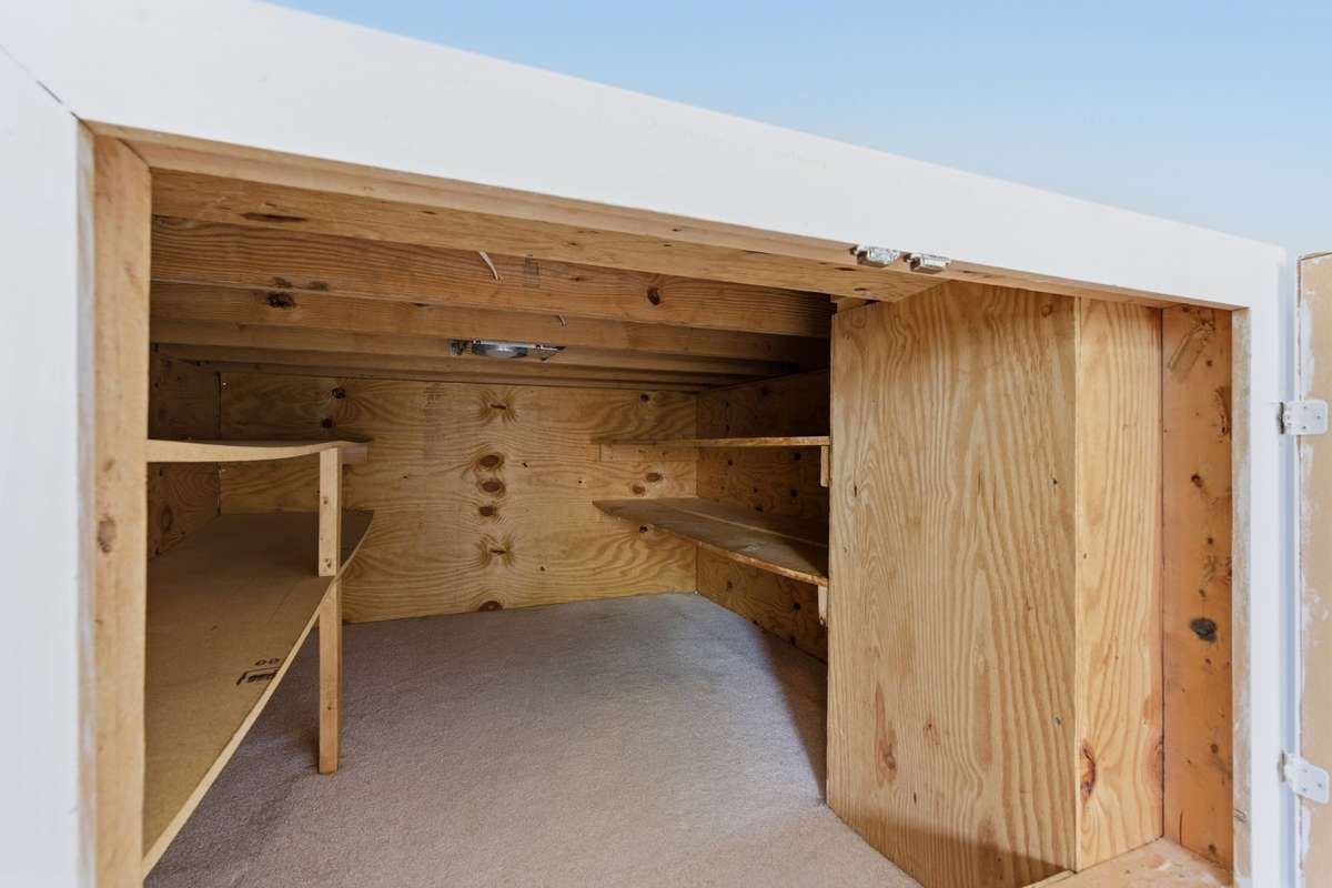 Hidden storage in the massive bonus room above the garage.