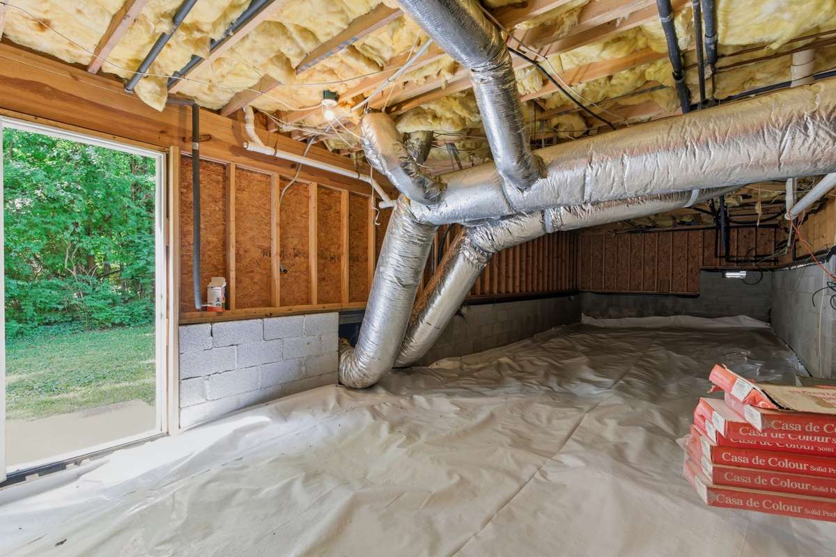 Massive crawlspace that can be additional storage or converted to more living space.