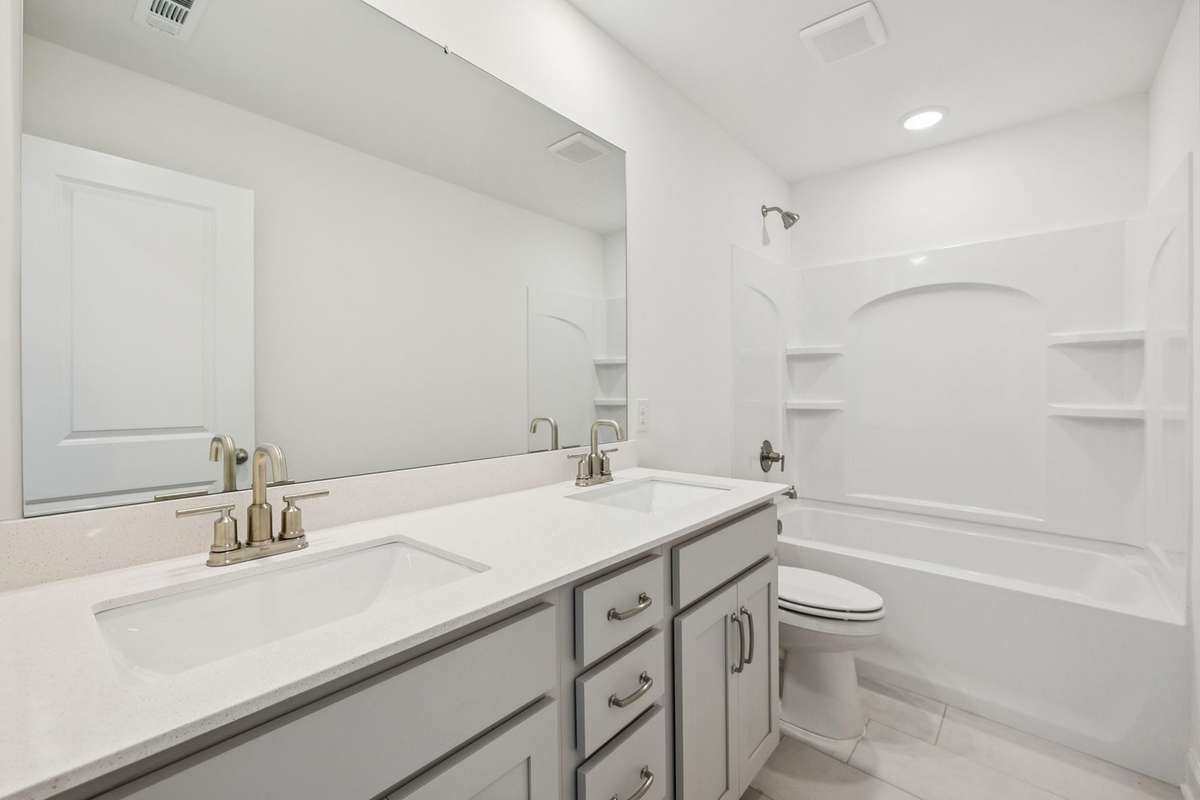 Macon guest bath. Picture is for illustrative purposes only. May be of similar home, same floorplan. Options, upgrades, colors, selections, designs, may vary.