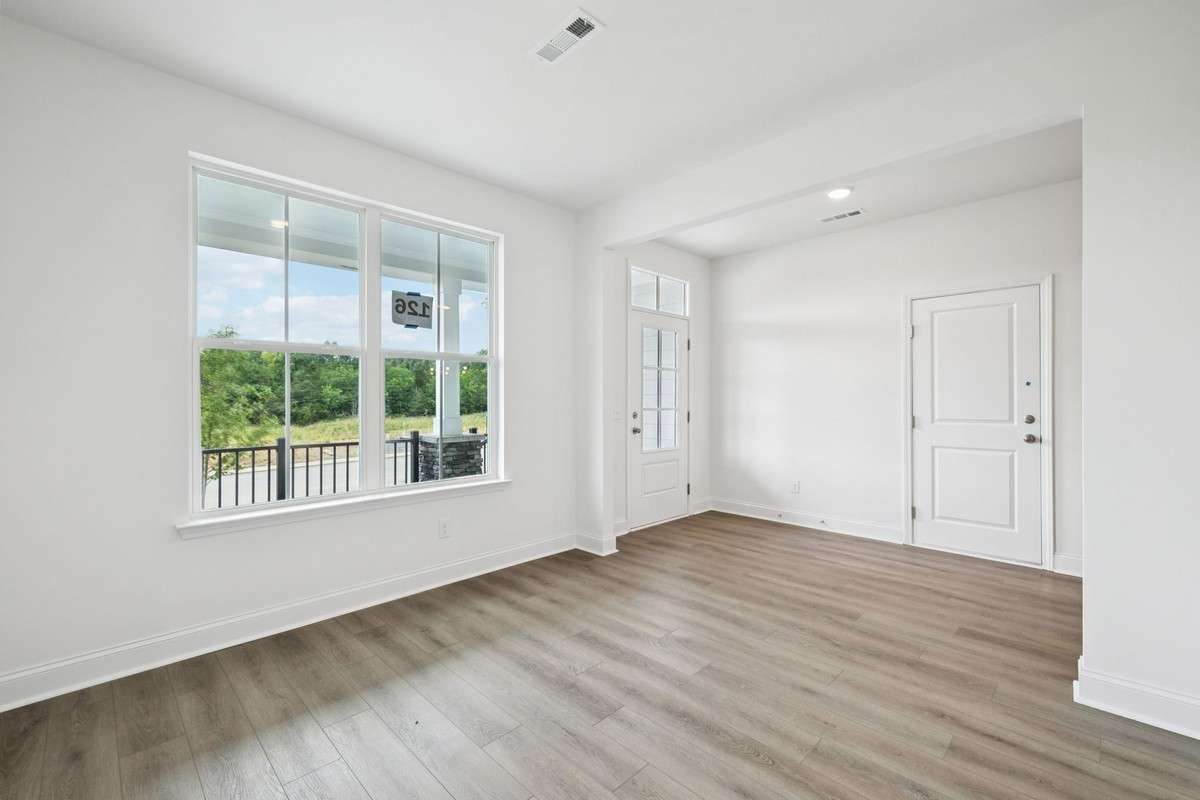 Macon flex room. Picture is for illustrative purposes only. May be of similar home, same floorplan. Options, upgrades, appliance package, colors, selections, designs, may vary.