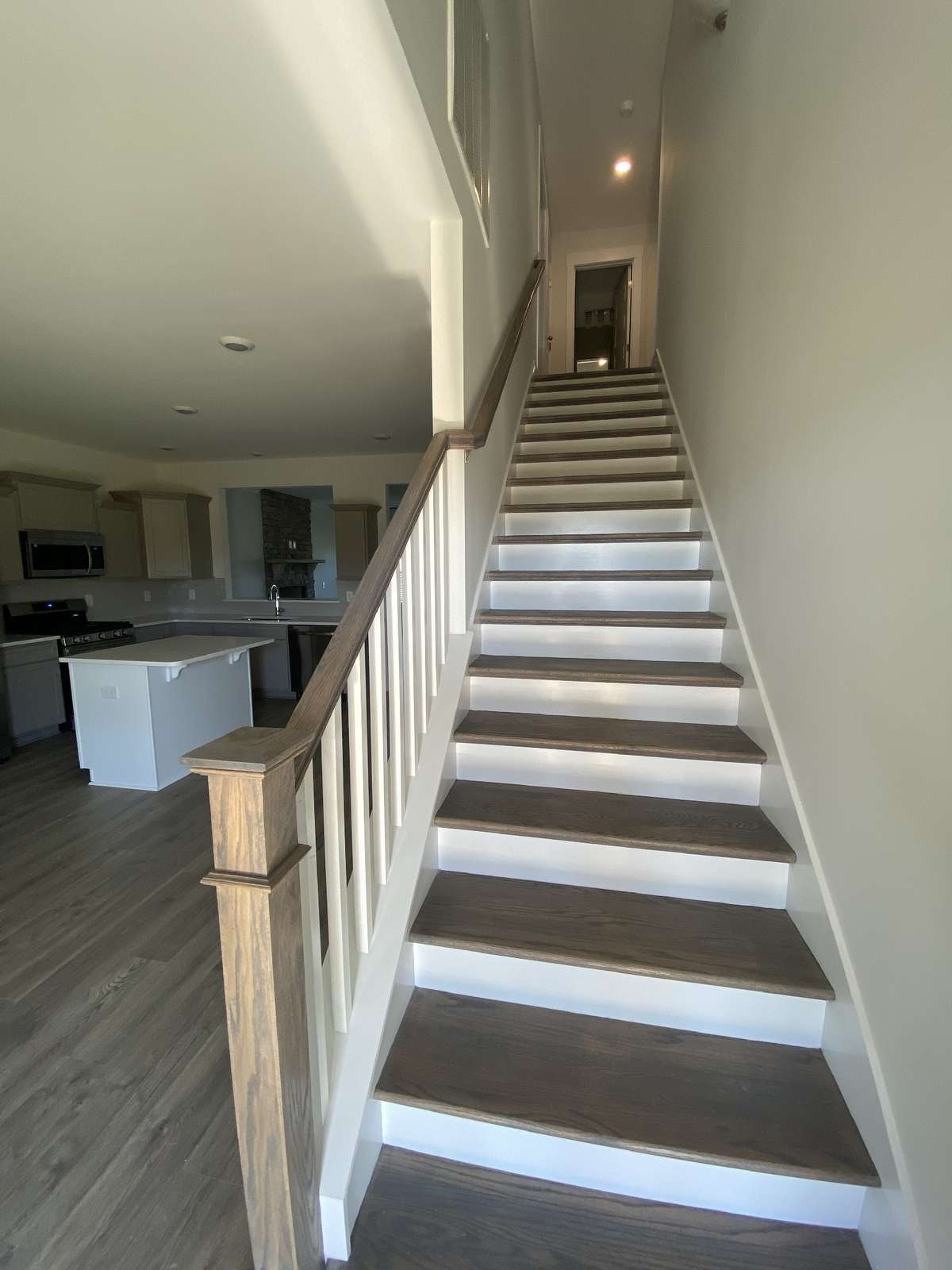Photo is of a completed model not the actual house features will be the same or similiar but selections and options may vary.