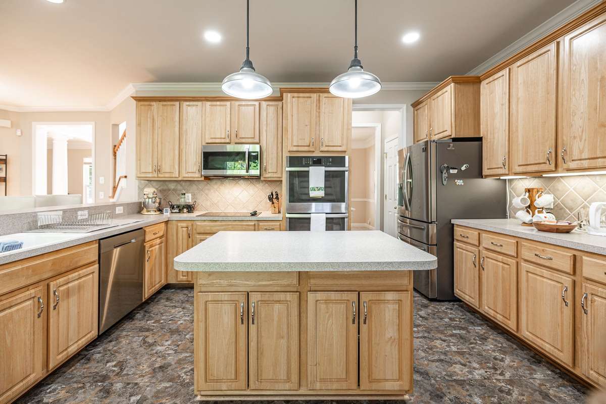 Kitchen has plenty of cupboard and counter space.