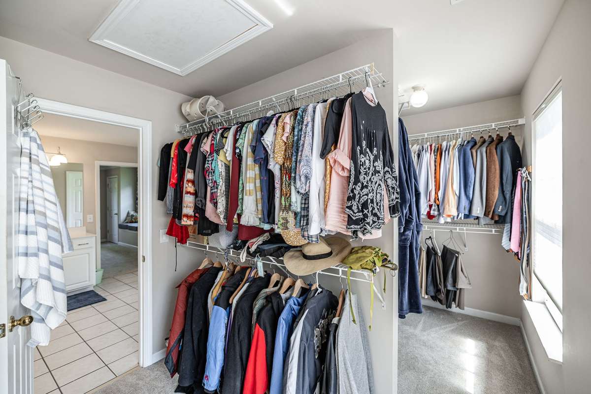Oversized walk-in closet in primary suite
