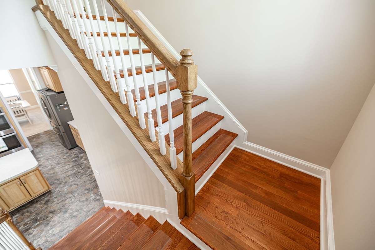 stairwell from kitchen to upstairs bedrooms and bonus.