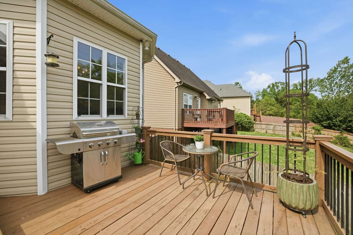 The large deck has room for your grill, an outdoor table...
