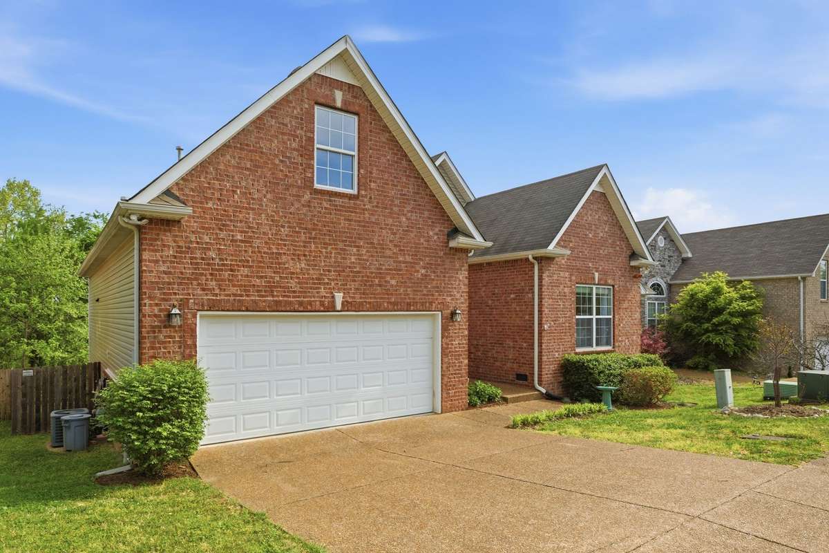 The 2 car garage easily accommodates to mid-size vehicles.