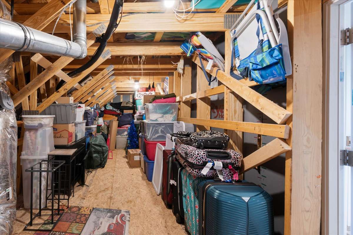 The walk-in attic (conveniently accessed from the loft area at the top of the stairs) is extra deep  and offers abundant storage.