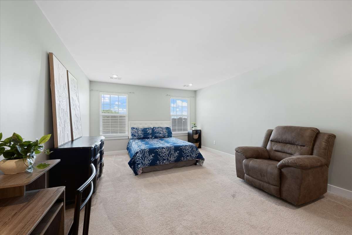 Bedroom #4 is extra-large, with space for sleeping, relaxing, and a work station!  It could also be used as a hobby room, exercise space, and …???
