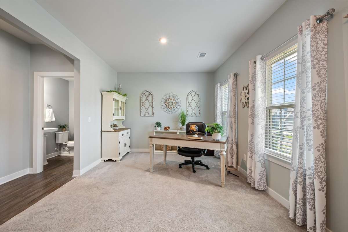 Flexible space near the front door that can be used as home office, living room, or formal dining room.