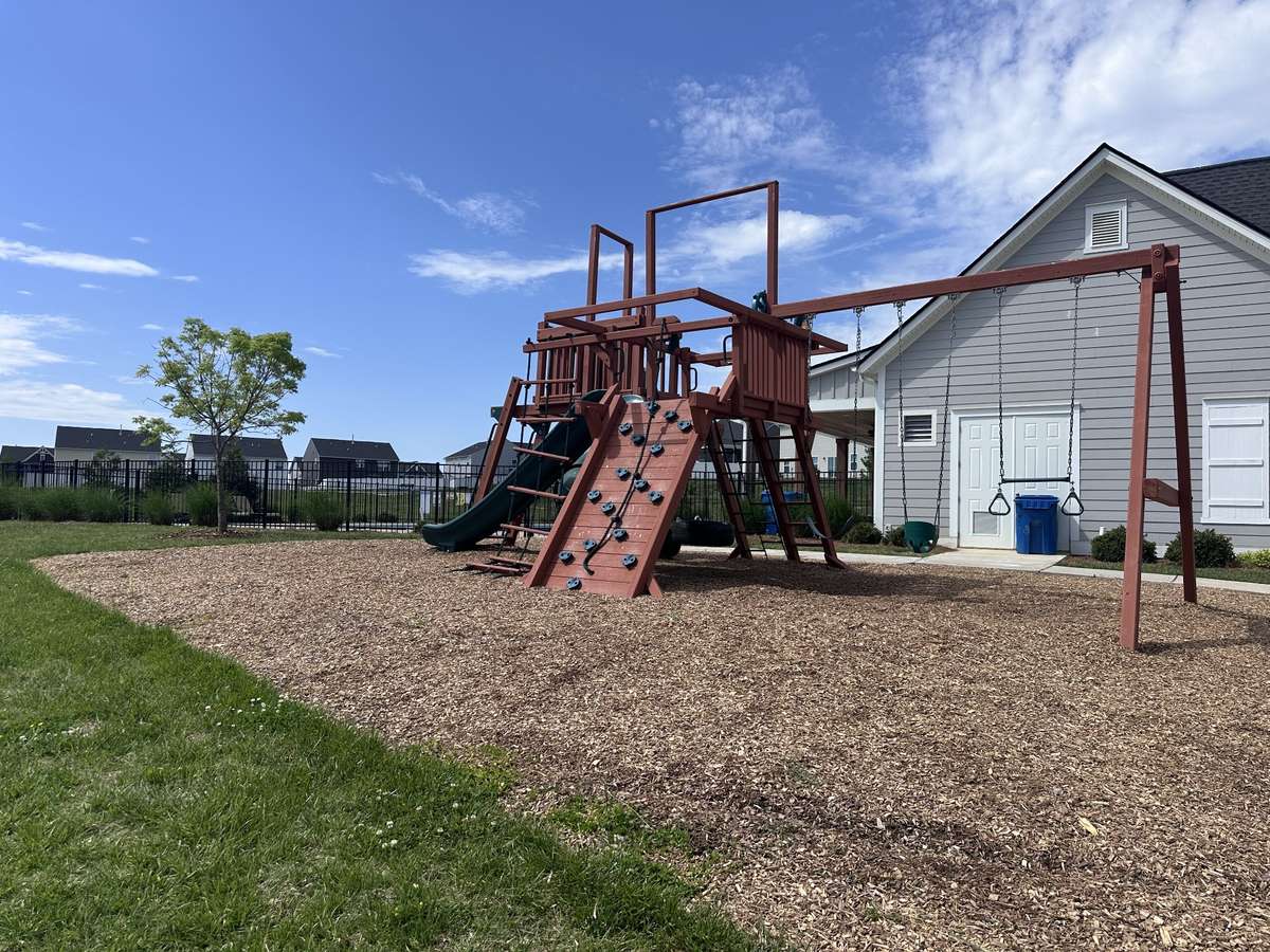 Community playground adjacent to pool and cabana - there is also a pickleball court!