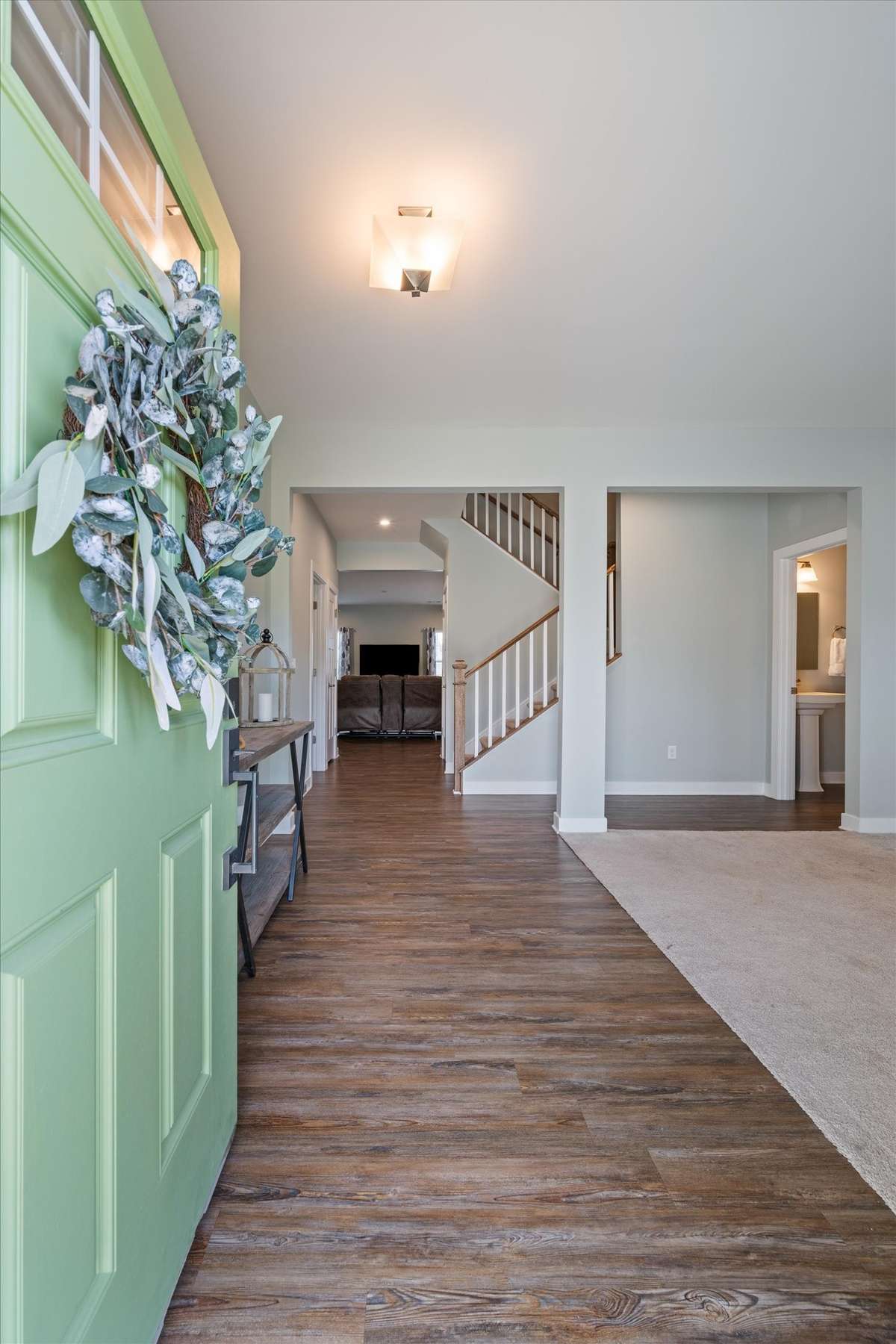 A spacious foyer creates a warm and inviting welcome.