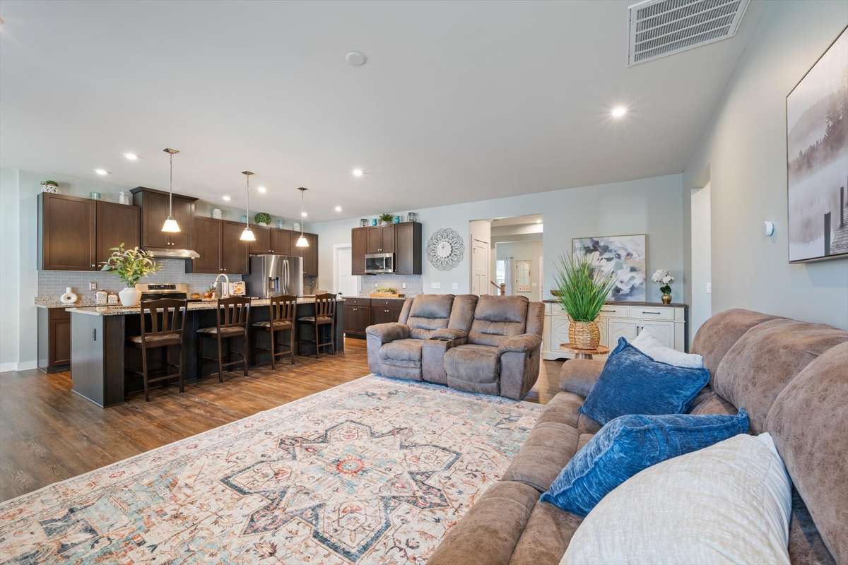The open concept living room and kitchen provide fantastic space for entertaining!
