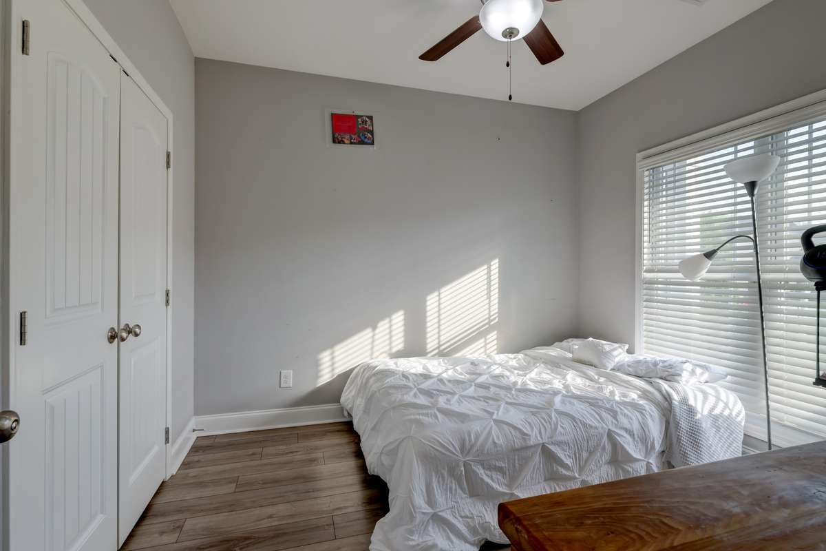 Main floor bedroom can be used for office space, guest bedroom, etc