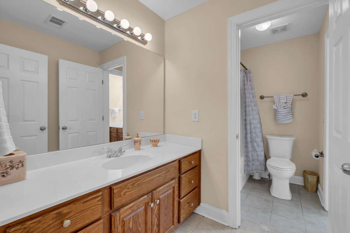 The Vanity area that the 4th bedroom uses separate from the Tub/Shower area that is shared by the 3rd bedroom.