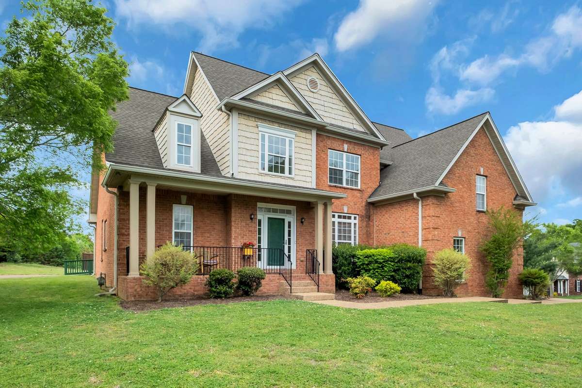 Two driveways, one of the right side leads to the double garage. The driveway on the left side has a ramp to the back covered porch.