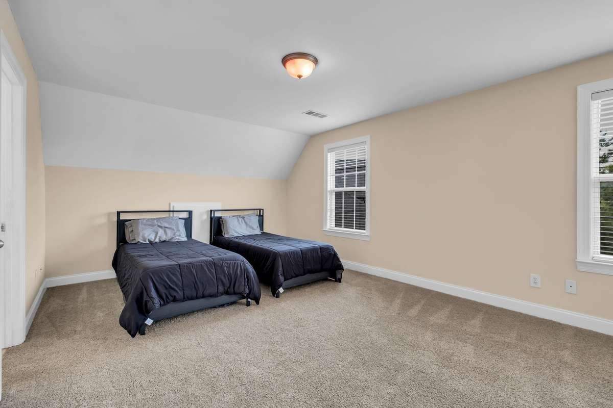 3rd bedroom is upstairs and has access to it's own sink area then Jack and Jill shower/tub area shared by the 4th bedroom upstairs.
