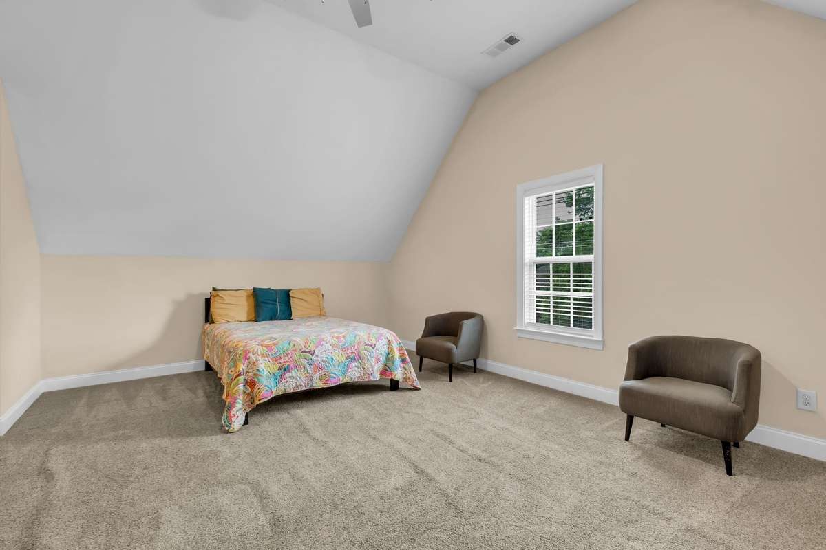 Bonus/Rec Room has several areas.  This family used it as a bedroom with sitting area.