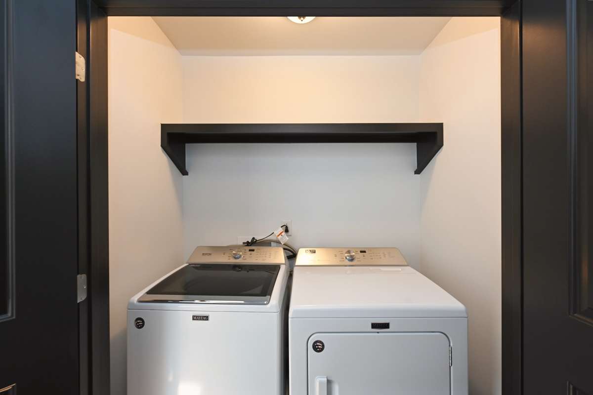 Laundry closet upstairs between 2 bedrooms.  Washer and Dryer are included