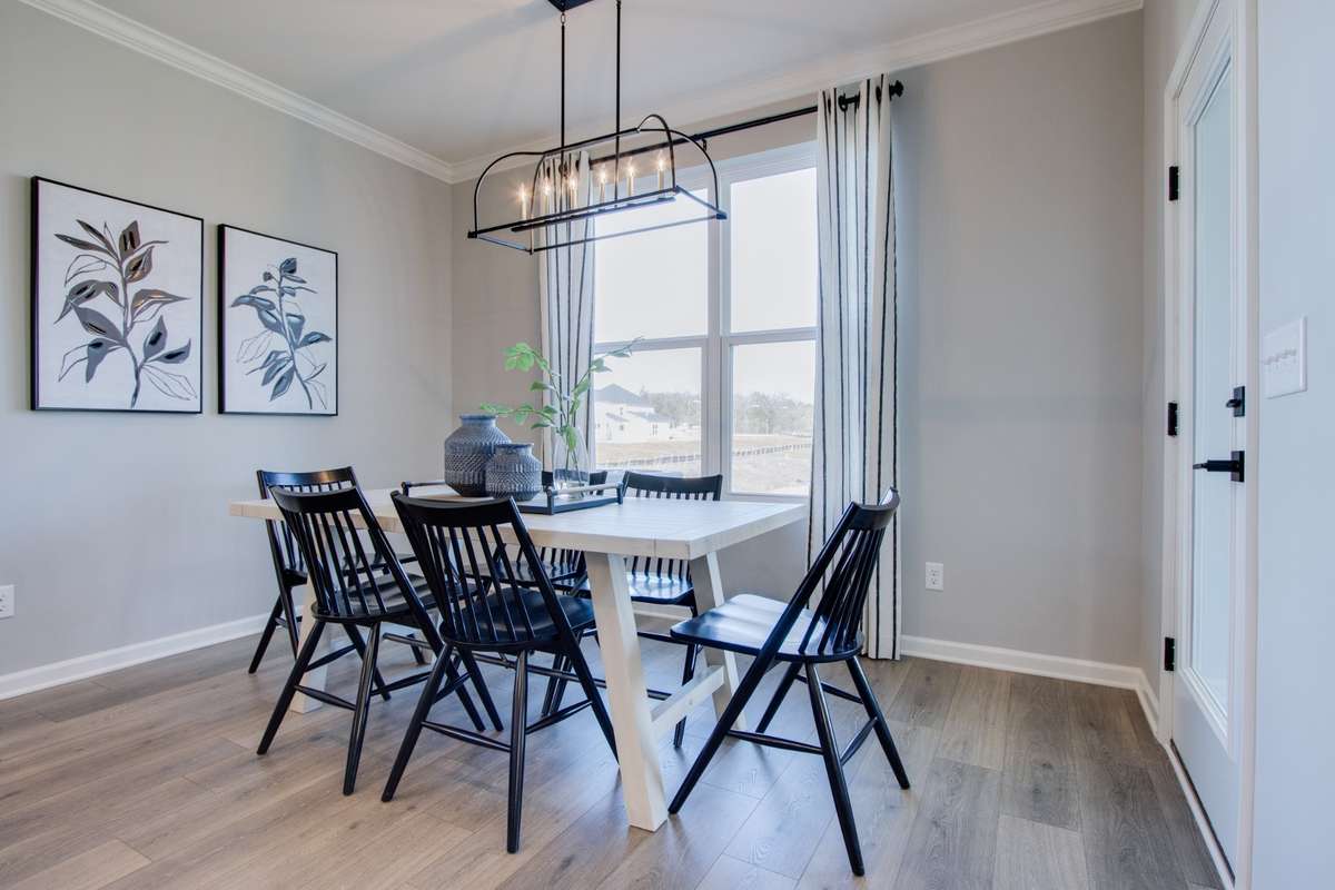All photos are of model home* Separate Dining area but still open to the Kitchen & Great Room