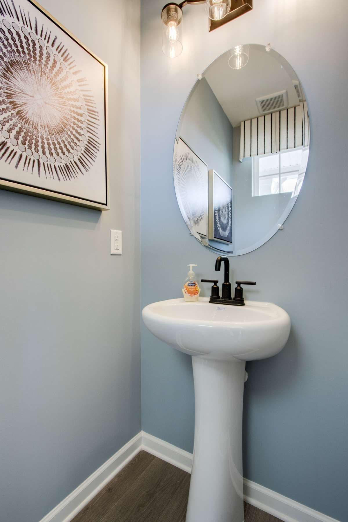 All photos are of model home* 1/2 Bath downstairs