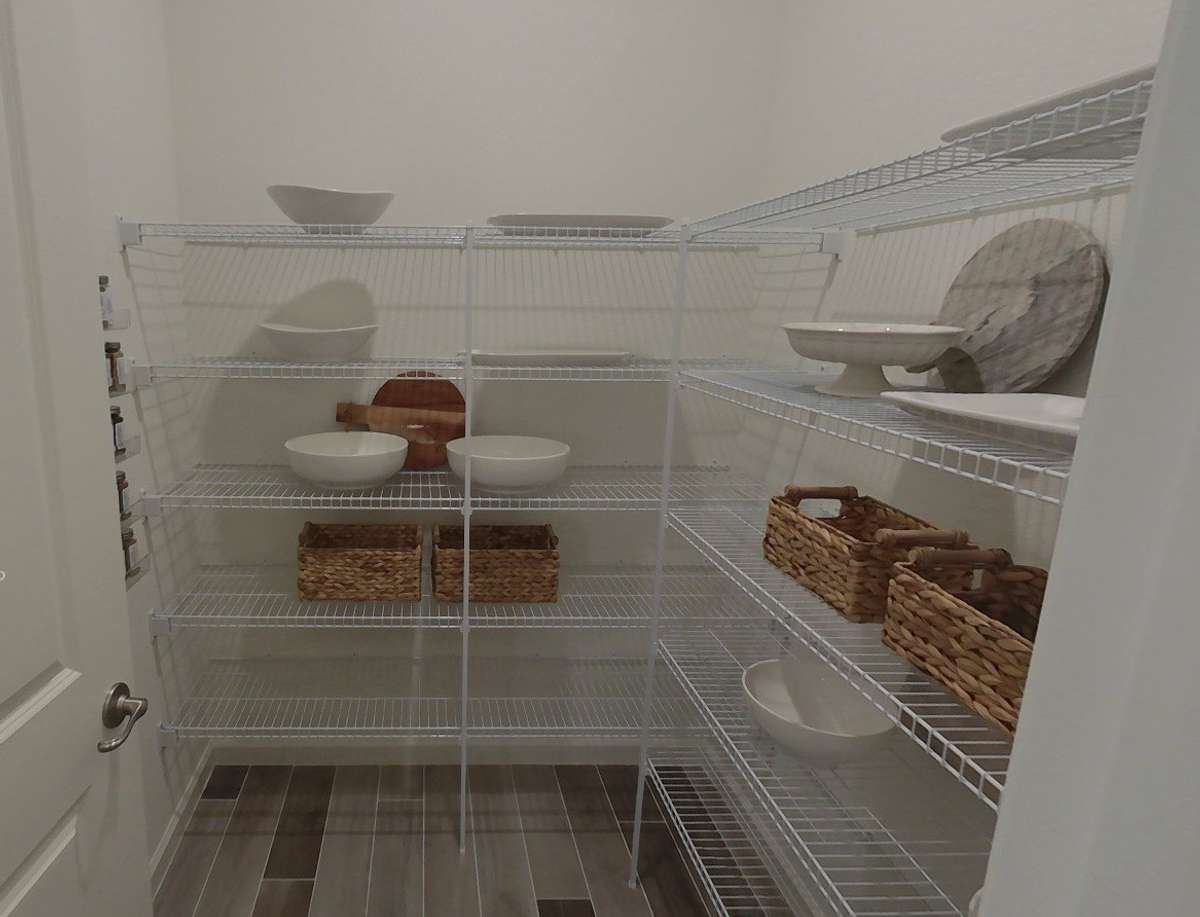 Spacious walk in pantry & closets throughout this entire floorplan *photo from previously built Edison Floorplan*