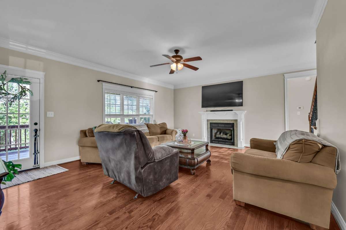 2971 Prince Drive Great Room has hardwood flooring and fireplace with gas logs.