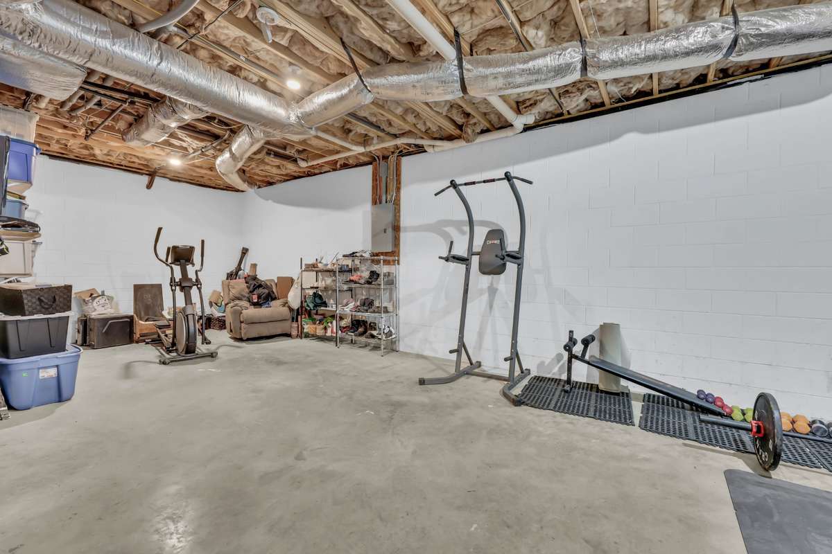 2971 Prince Dr. - large partially finished room in basement that could used for work out room, storage.