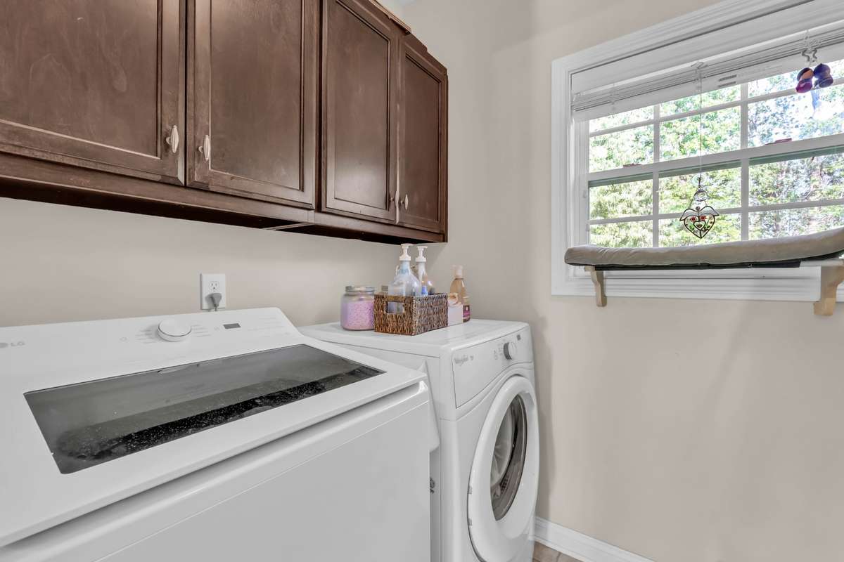 2971 Prince Dr. - Laundry room with cabinets.