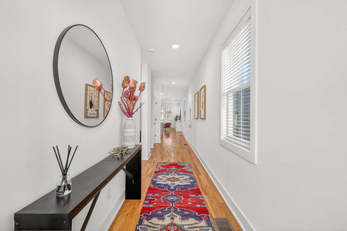 Entry way from the front door. There is a small mudroom area at the entry by the garage door. Hardwood floors and lots of natural lights.
