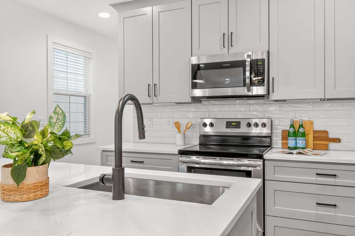 Stainless steel appliances and sink.