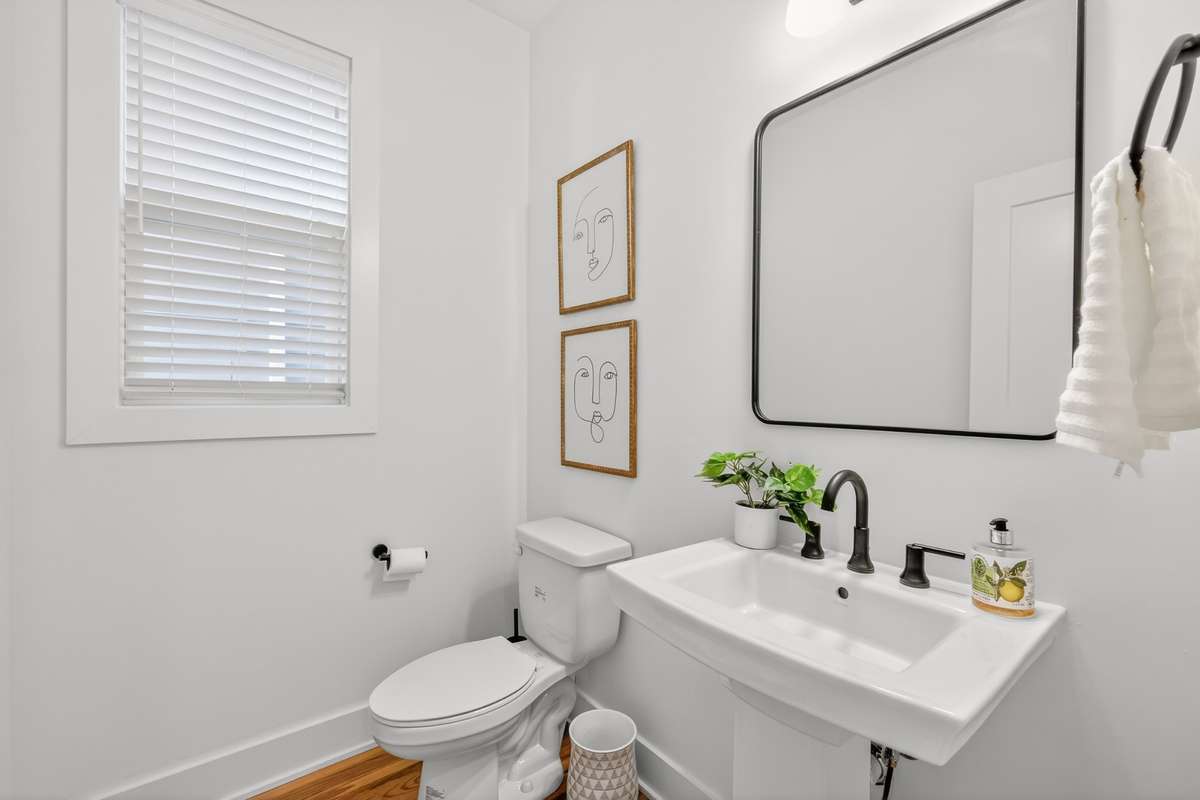 Powder room on the first floor. Hallway access.