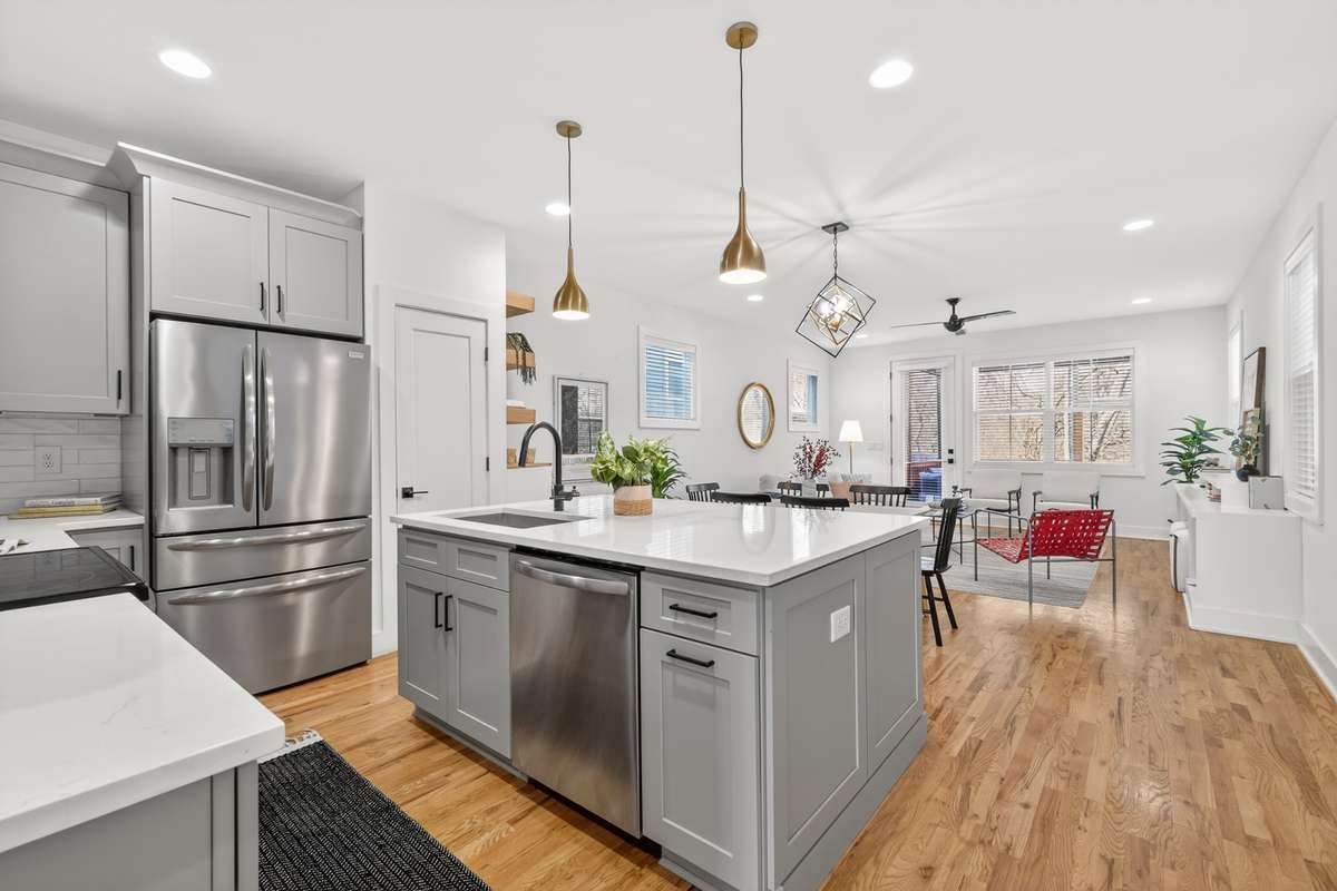 Beautiful open concept entertaining space on the first floor. Private living quarters upstairs. Hardwood frloors throughout the first floor and primary suite and hallway.