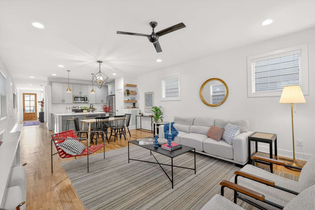Living room area with the view straight into the kitchen. Great for entertaining.