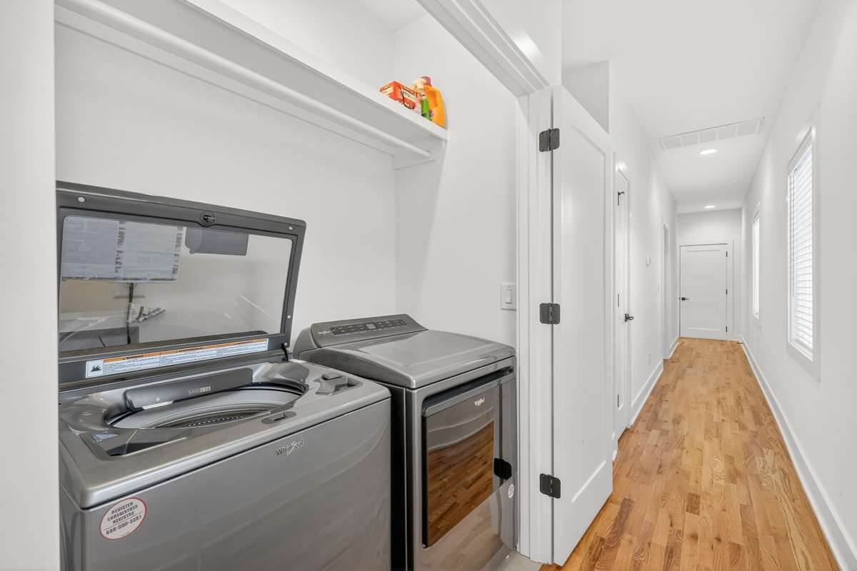 Laundry closet in the hallway for convenience to all three bedrooms. Appliances are negotiable. Hardwood floors and 2 windows. Utility closet at the end of the hall.