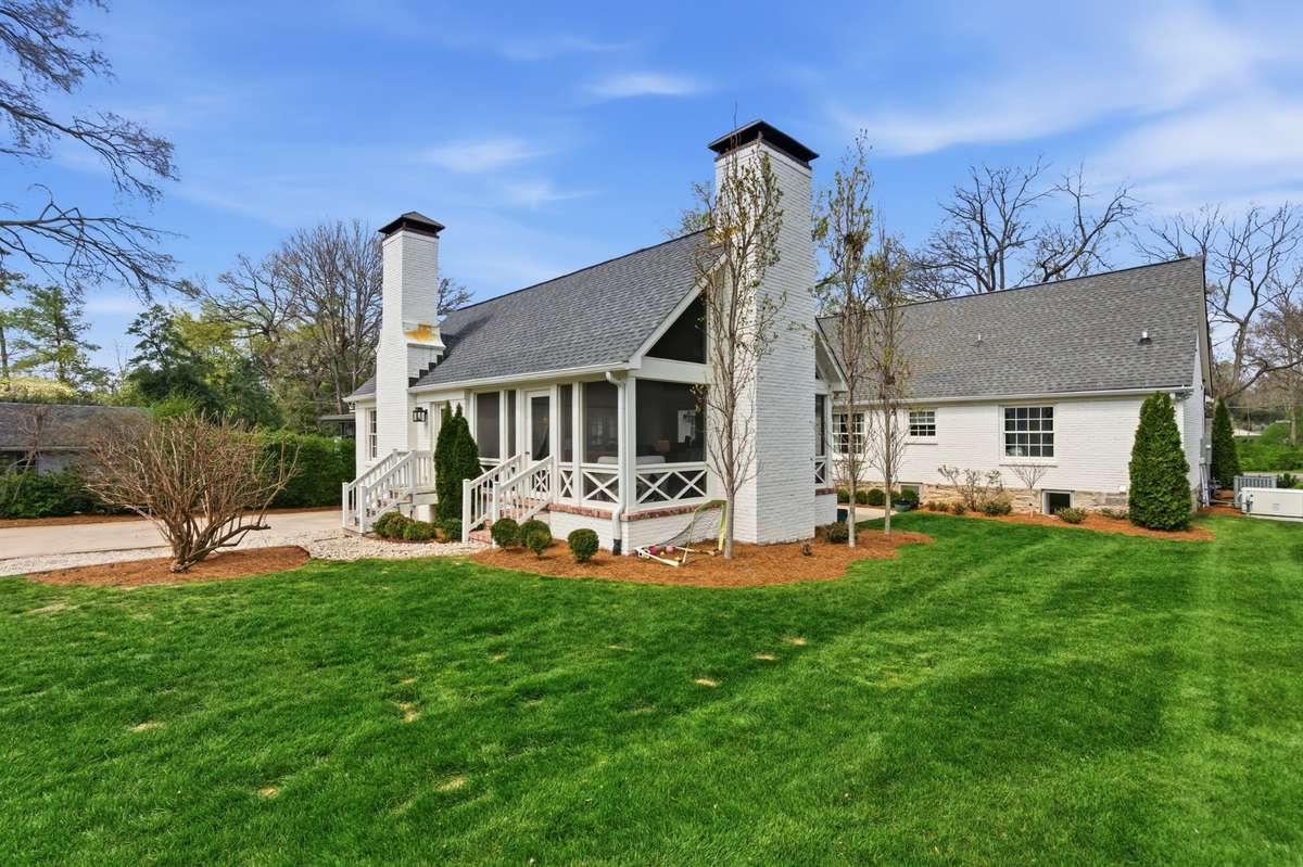 Back of home - charm galore and amazing yard - a rarity these days in the middle of Green Hills!