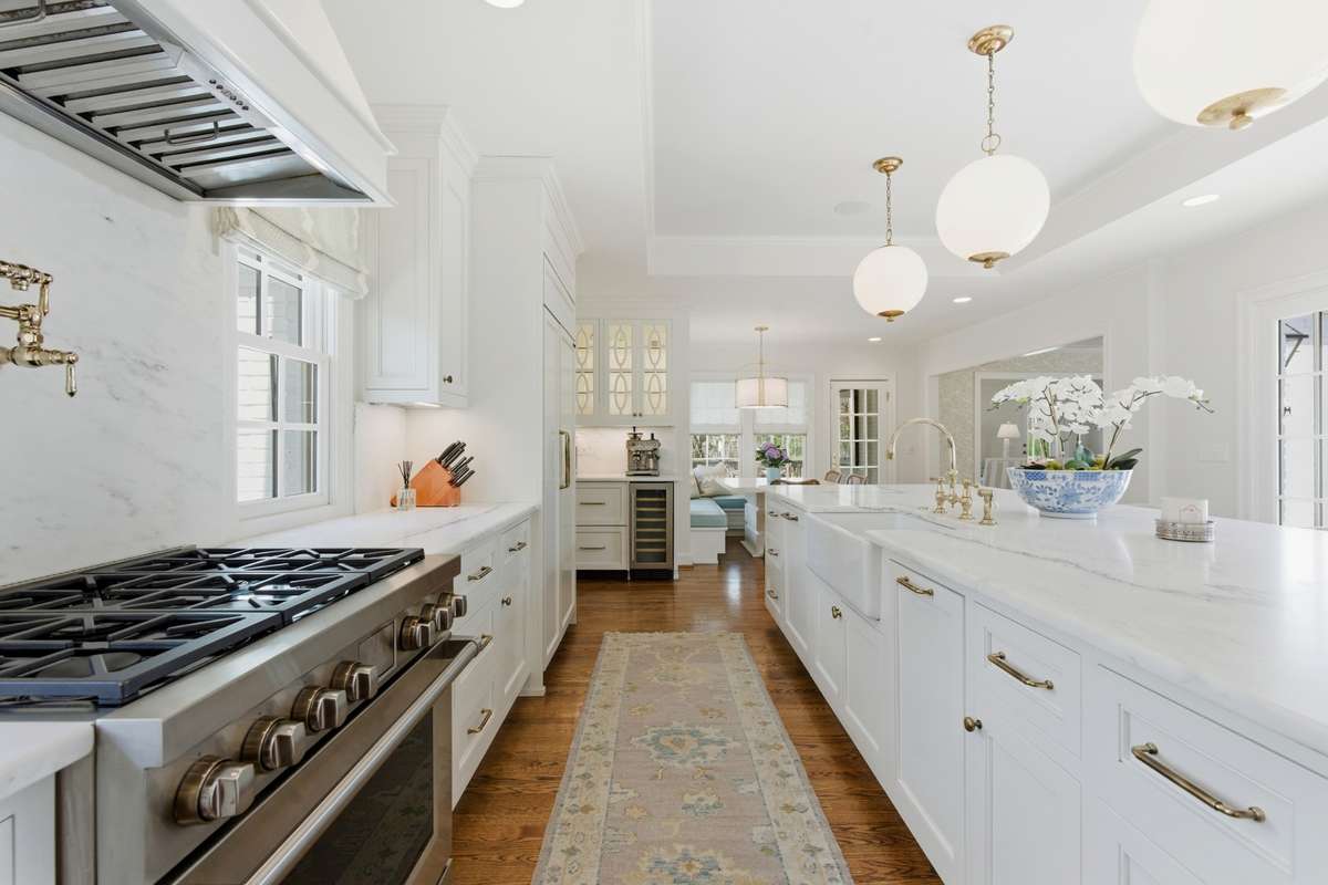 Notice the coffee/wine bar with beverage refrigerator along back wall.