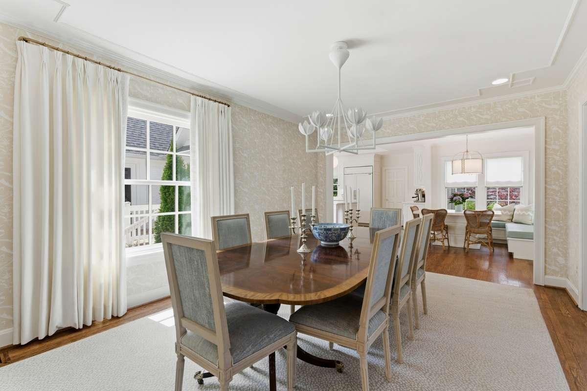 Dining room flows seamlessly to kitchen and living room.