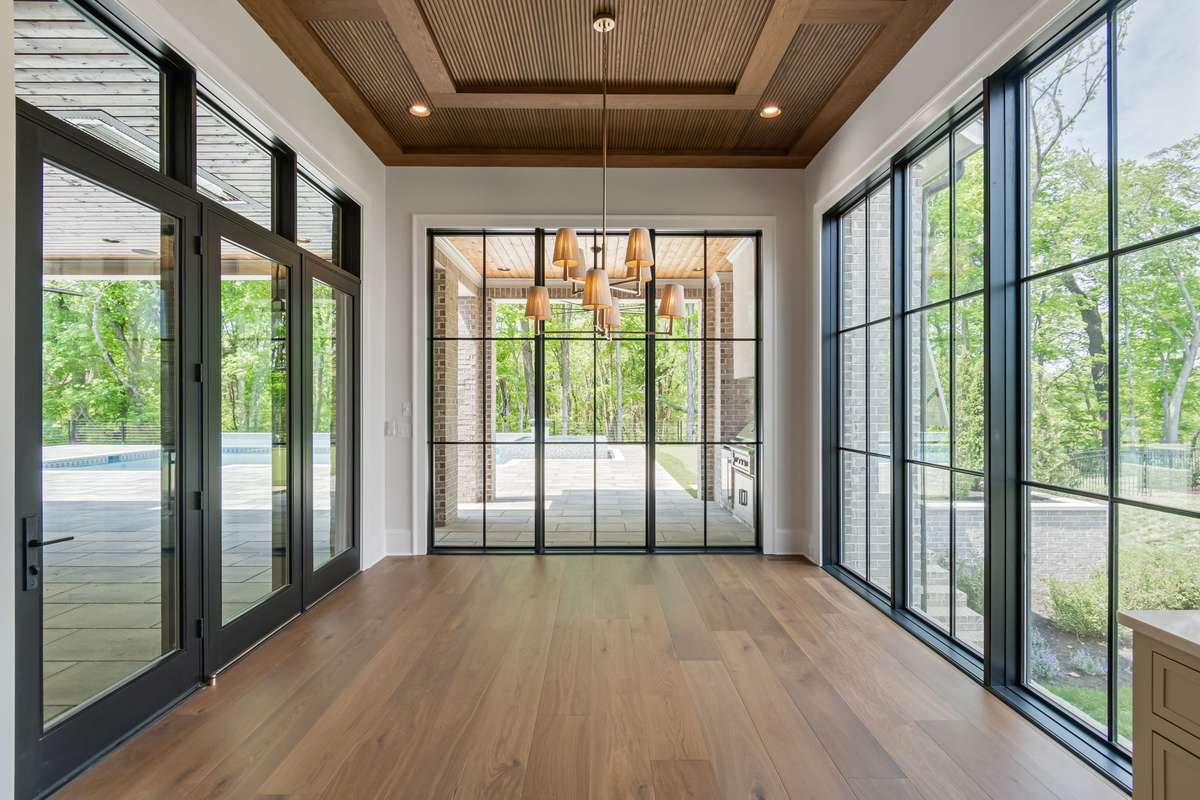 Dining Room captures the views and privacy of this homesite with windows on 3 sides.