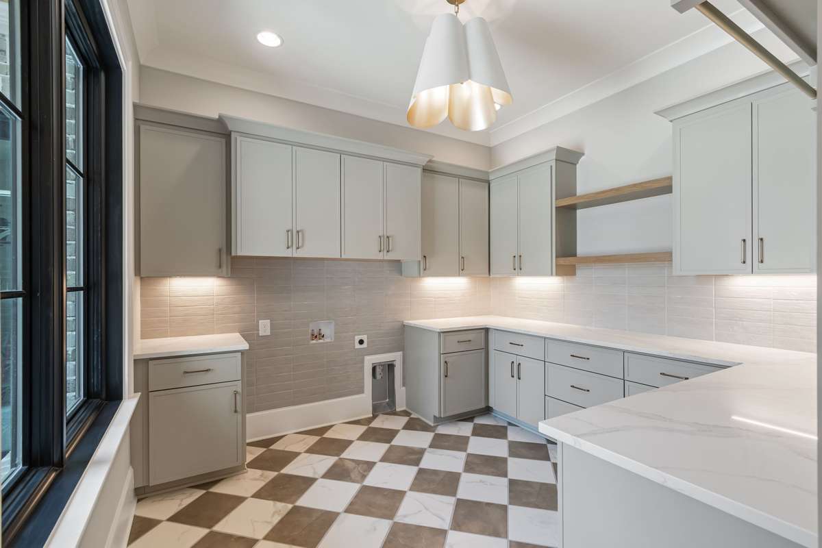 Laundry Room off of Garage and Mudroom