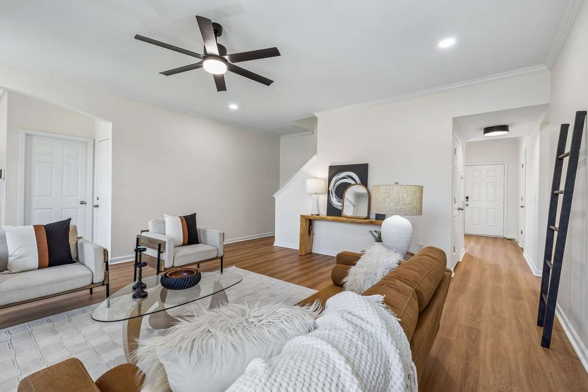 Brand new lighting and flooring and paint! Great living room!