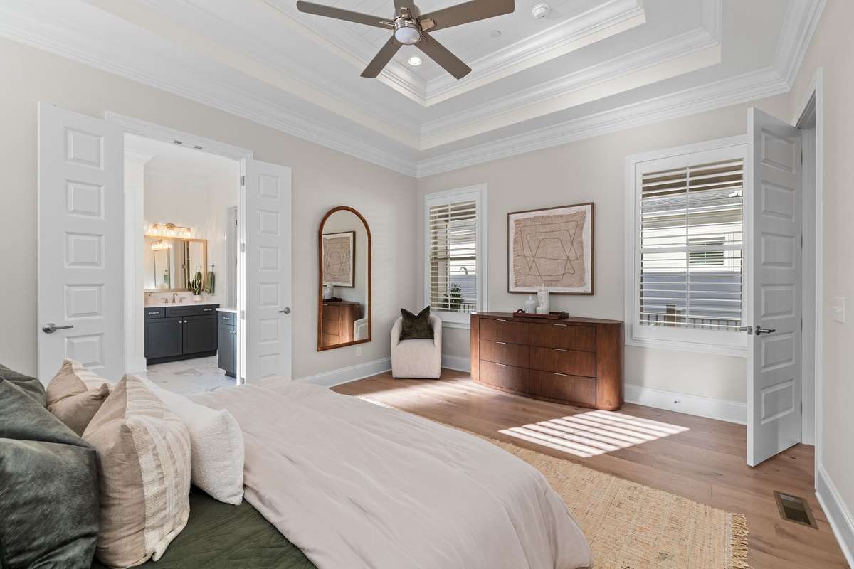 Photos represent a model home of the same floor plan and are not the actual home being constructed. Interior finishes, selections, and colors will be different.