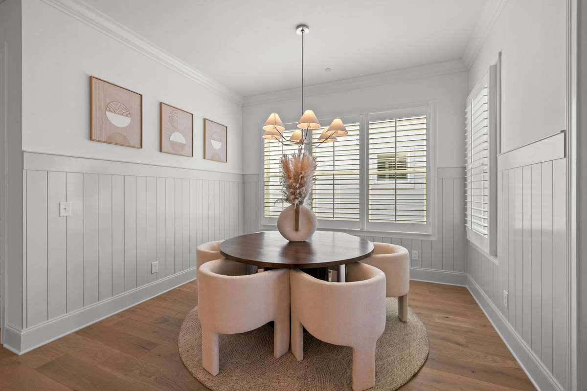 Photos represent a model home of the same floor plan and are not the actual home being constructed. Interior finishes, selections, and colors will be different.
