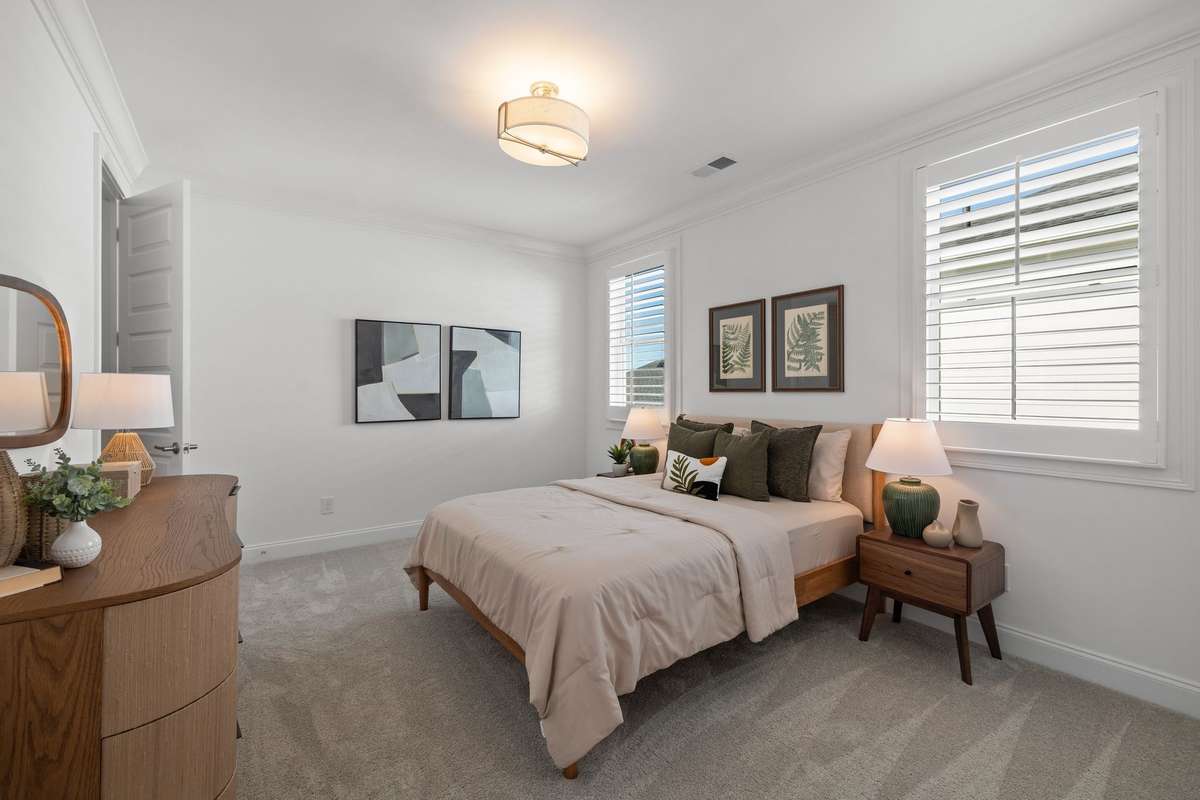 Photos represent a model home of the same floor plan and are not the actual home being constructed. Interior finishes, selections, and colors will be different.