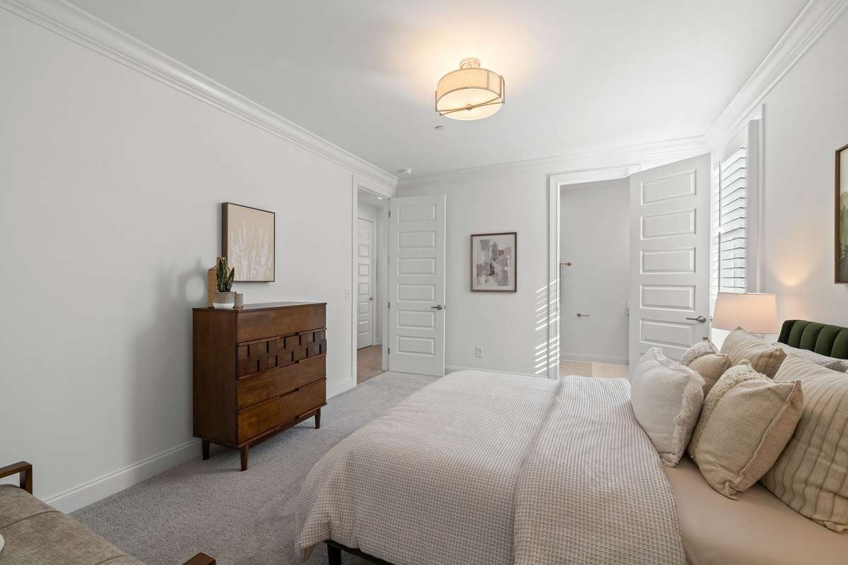 Photos represent a model home of the same floor plan and are not the actual home being constructed. Interior finishes, selections, and colors will be different.