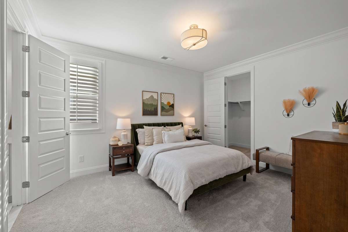Photos represent a model home of the same floor plan and are not the actual home being constructed. Interior finishes, selections, and colors will be different.